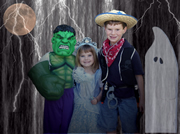 Children in Halloween costumes after photoshoping