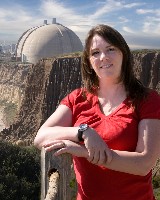 outdoor portrait, women leaning on post